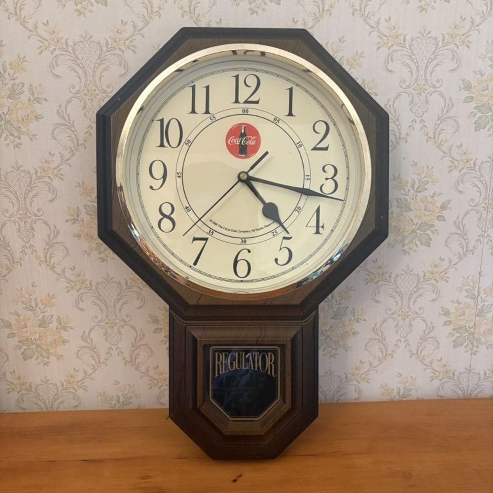 Front view of the Coca-Cola regulator-style quartz wall clock