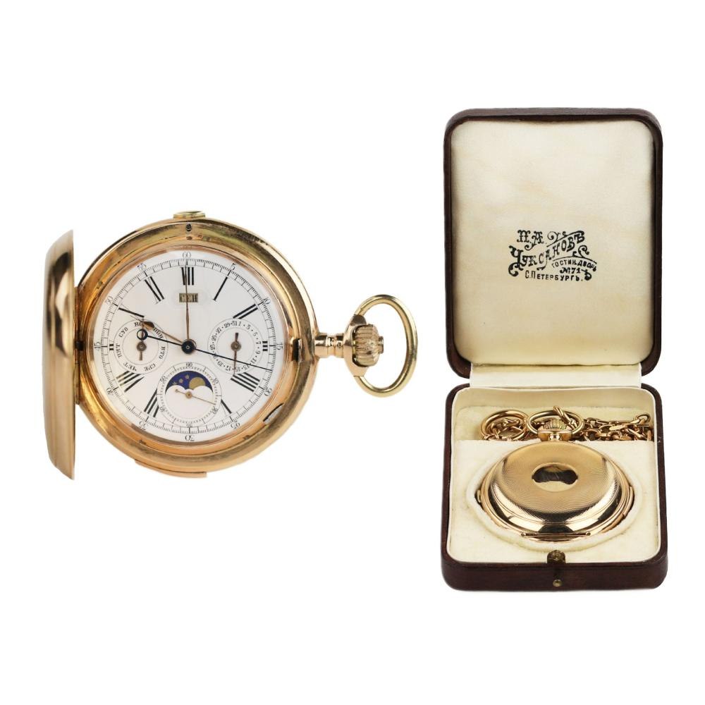 Front view of the Louis Armand pocket watch with its Russian-language dial and the accompanying retailer's box.