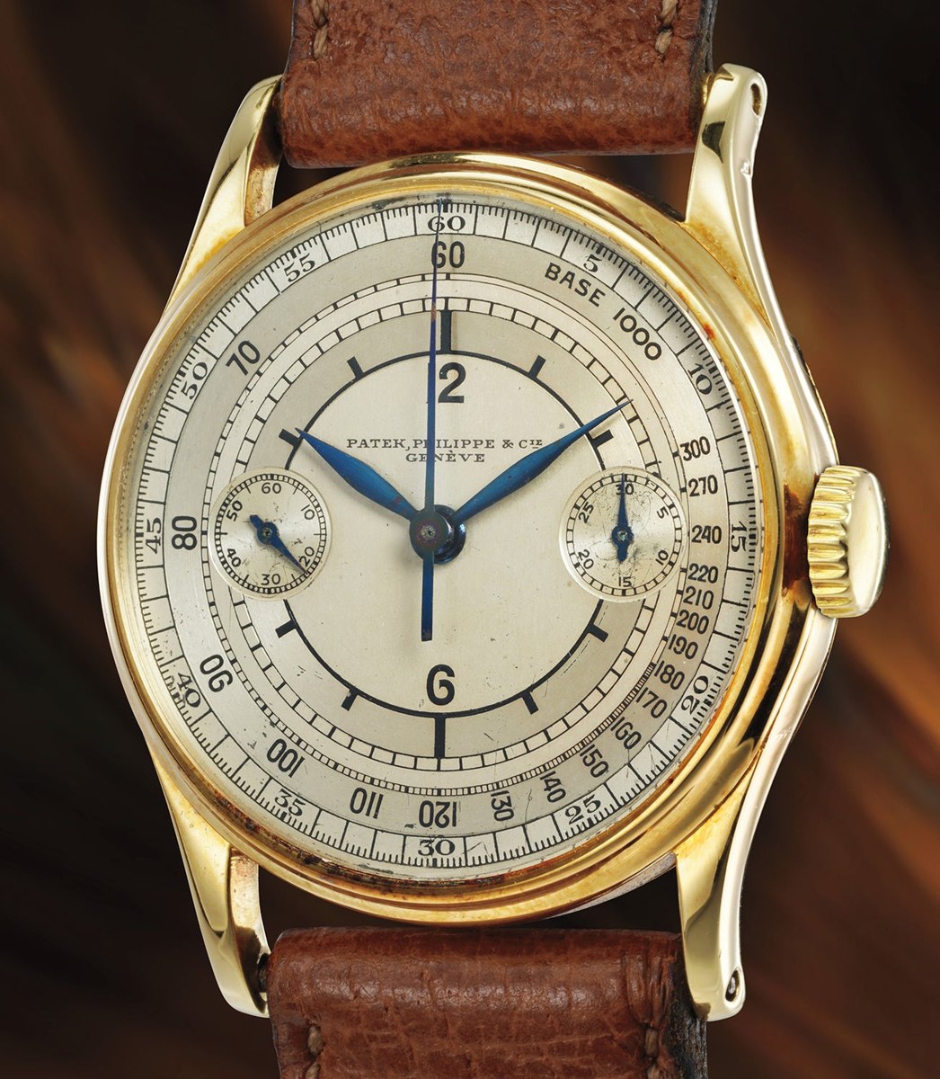 Dial and case view of the Patek Philippe Ref. 130 single-button chronograph in 18k yellow gold