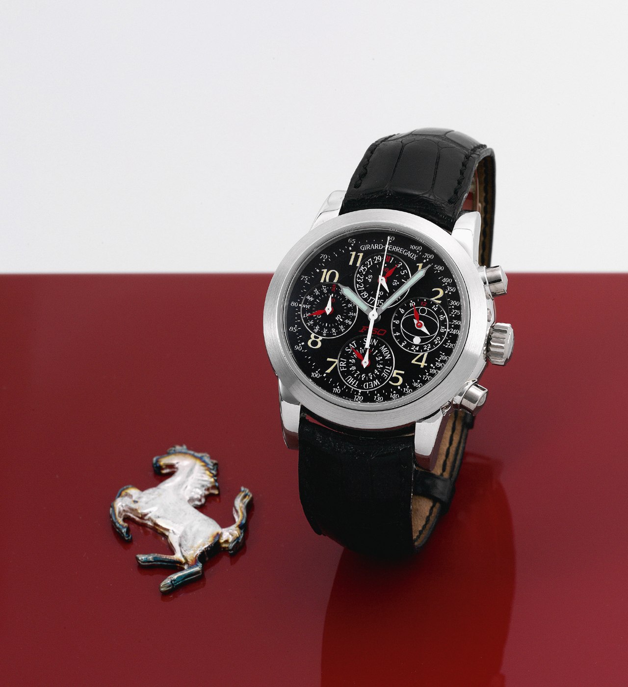 The Girard-Perregaux Ferrari Chronograph F 50, showing the black dial, subsidiary registers, and associated Ferrari emblem.