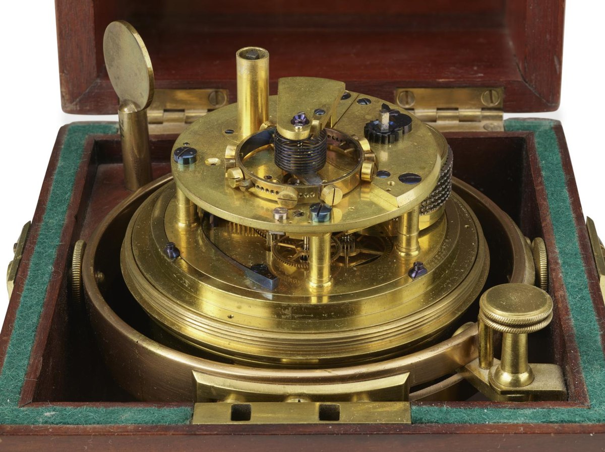 Movement view of the marine chronometer by Charles Shepherd in its gimballed brass bowl and wooden box