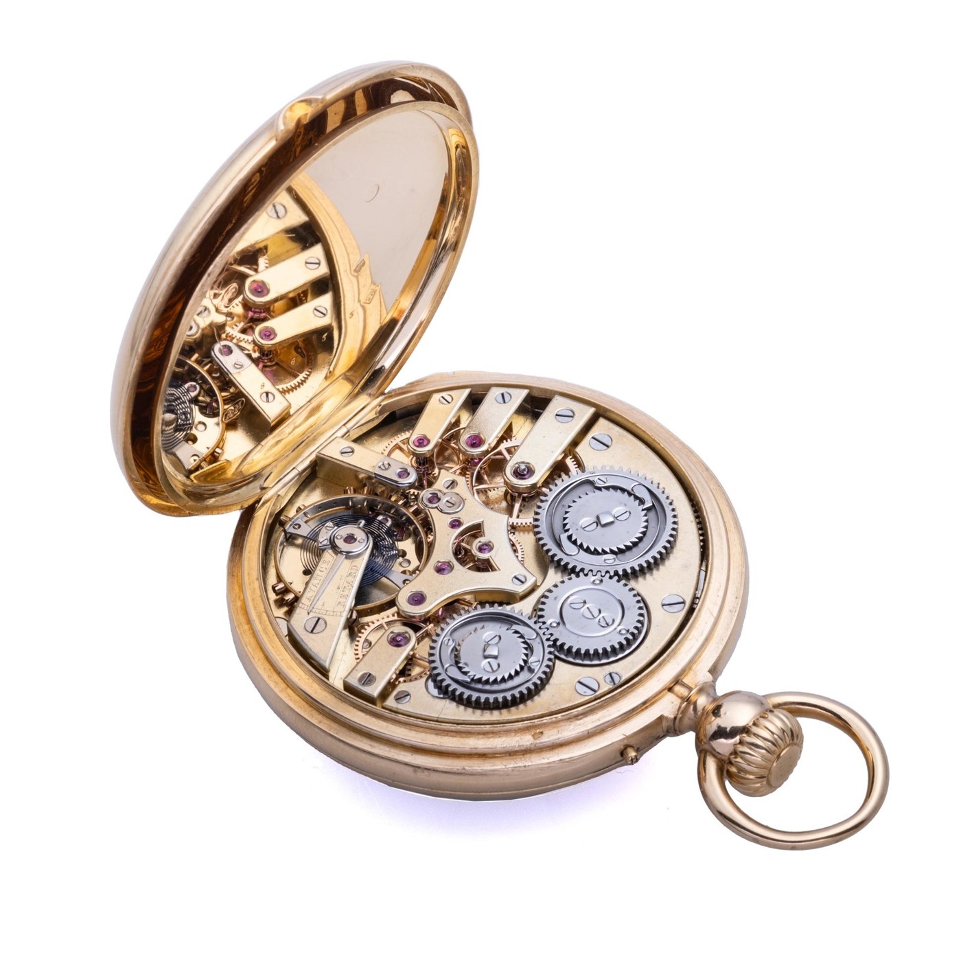 View of the open case back of the Louis Audemars 18k yellow gold pocket watch showing the movement, positioned with its cuvette reflecting the mechanism.