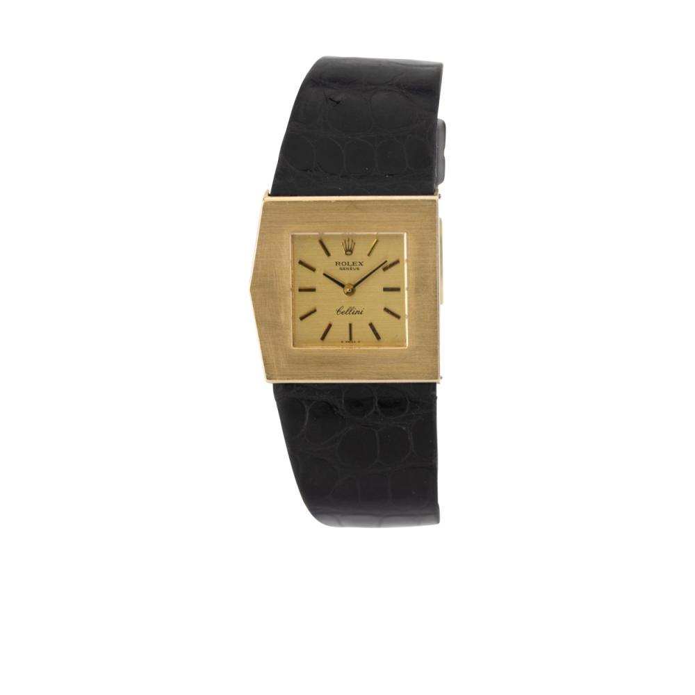 Front view of the Rolex Cellini King Midas watch featuring an asymmetric gold case and black strap.