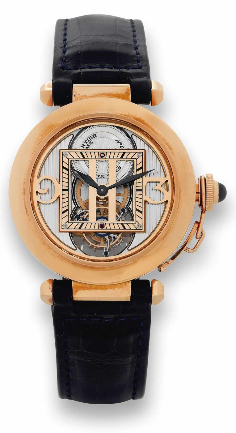 Front view of the Cartier Pasha Tourbillon showing the transparent dial, skeletonized Arabic numerals at 3 and 9 o'clock, and central minute track.