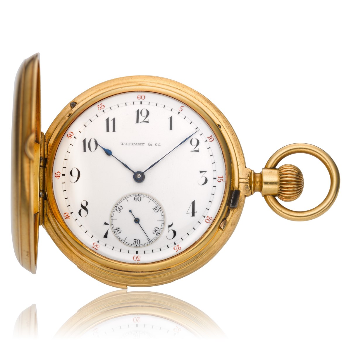 Front view of the open Tiffany & Co. pocket watch showing the dial, bezel, open front cover, and winding crown