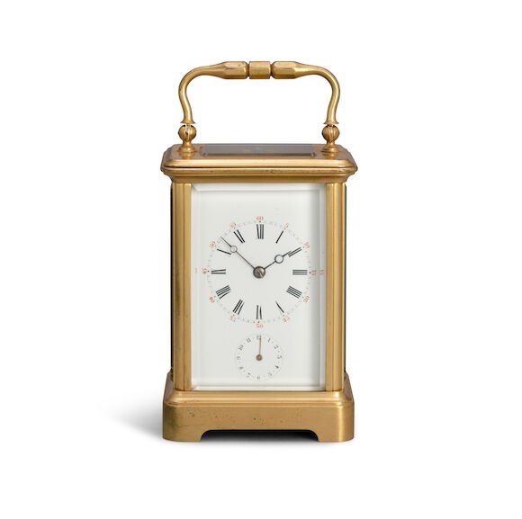 Frontal view of the French carriage clock with alarm dial and brass case