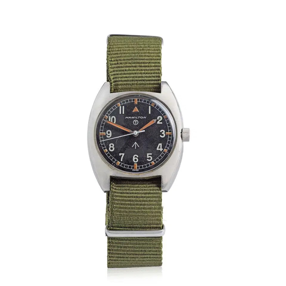 Front view of Hamilton tonneau-form military wristwatch on green fabric strap