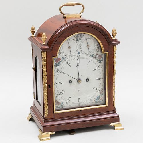 Three-quarter front view of George III brass-mounted mahogany mantel clock