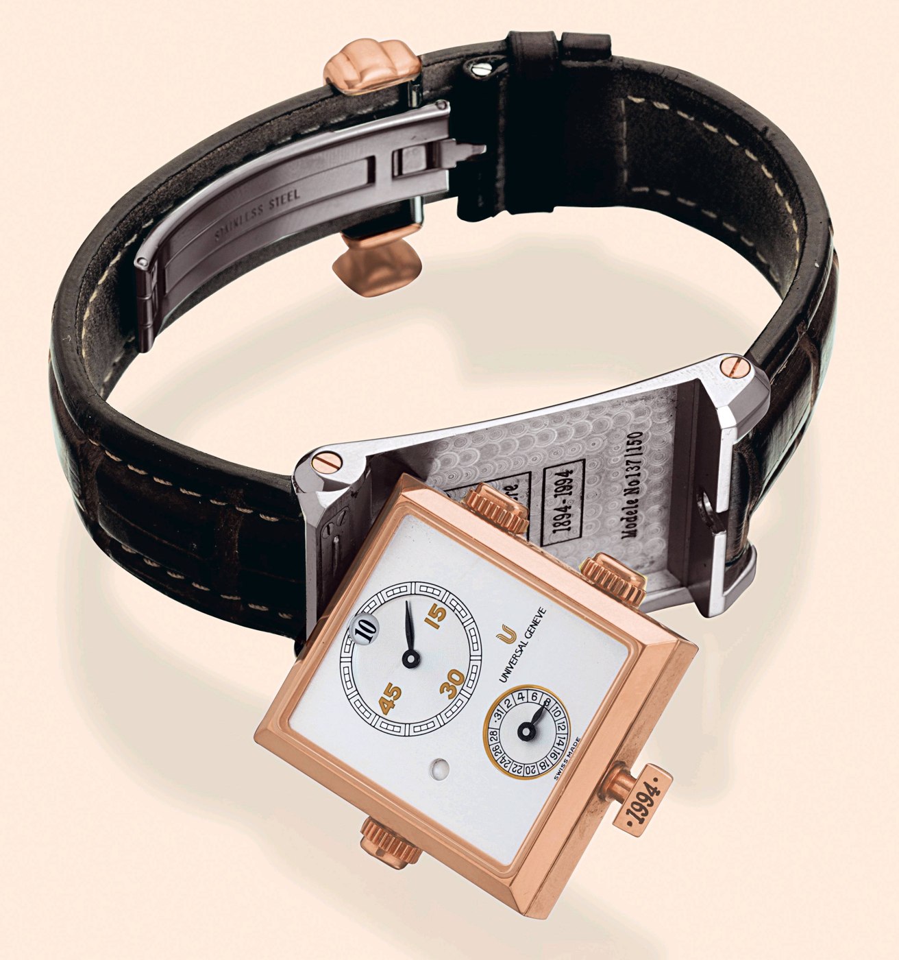 The Universal Genève Golden Janus Cabriolet, showing the inner 18K pink gold case partially rotated within the platinum outer body.