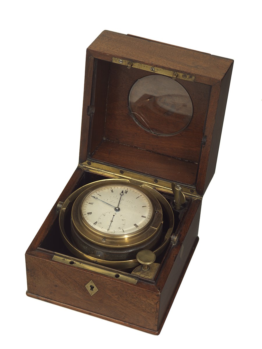 Overall view of Henri Motel marine chronometer No. 59 in opened mahogany box with brass gimbals