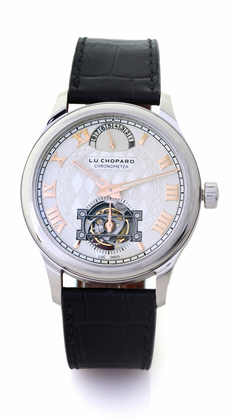 Frontal view of the Chopard L.U.C Tourbillon Only Watch 2013, featuring a silver dial with hand-engraved details, rose gold indices, and a tourbillon aperture.