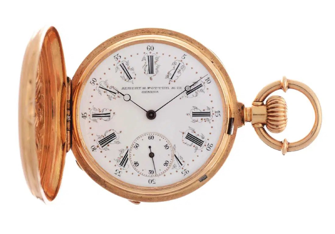 Front view of open pocket watch showing white decorative dial, moon hands, subsidiary seconds, and open hinged cover
