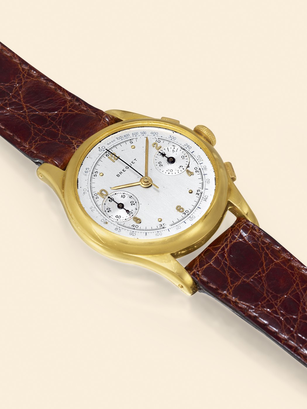 Front view of the Breguet 18K yellow gold chronograph wristwatch with brown leather strap.