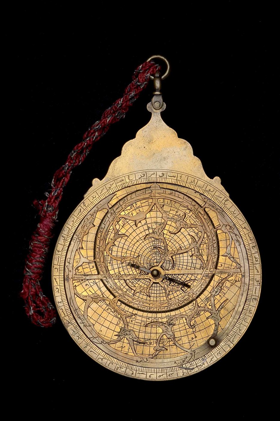 Front view of the 1653/4 brass astrolabe showing the foliate rete and throne assembly.