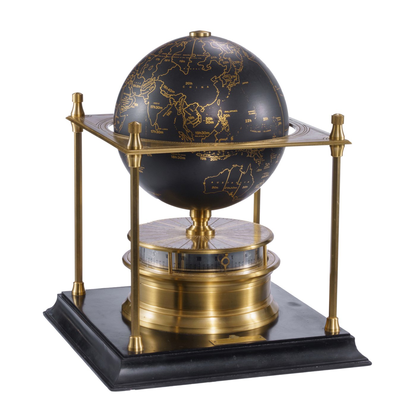 The Royal Geographical Society World Clock, showing the terrestrial globe within the four-pillar frame and the signed brass plaque on the ebonized base.