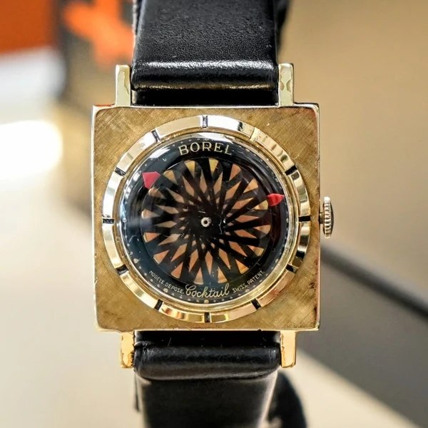 Front view of the 26.3 mm Ernest Borel Cocktail wristwatch with kaleidoscope disc dial and textured square case