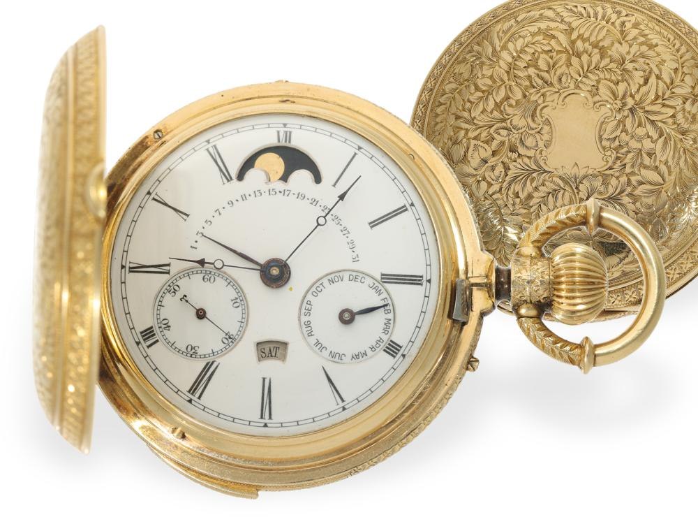 Front view of the gold hunting case pocket watch with the front cover open, displaying the enamel dial, retrograde date scale, moon phase, and calendar indicators.