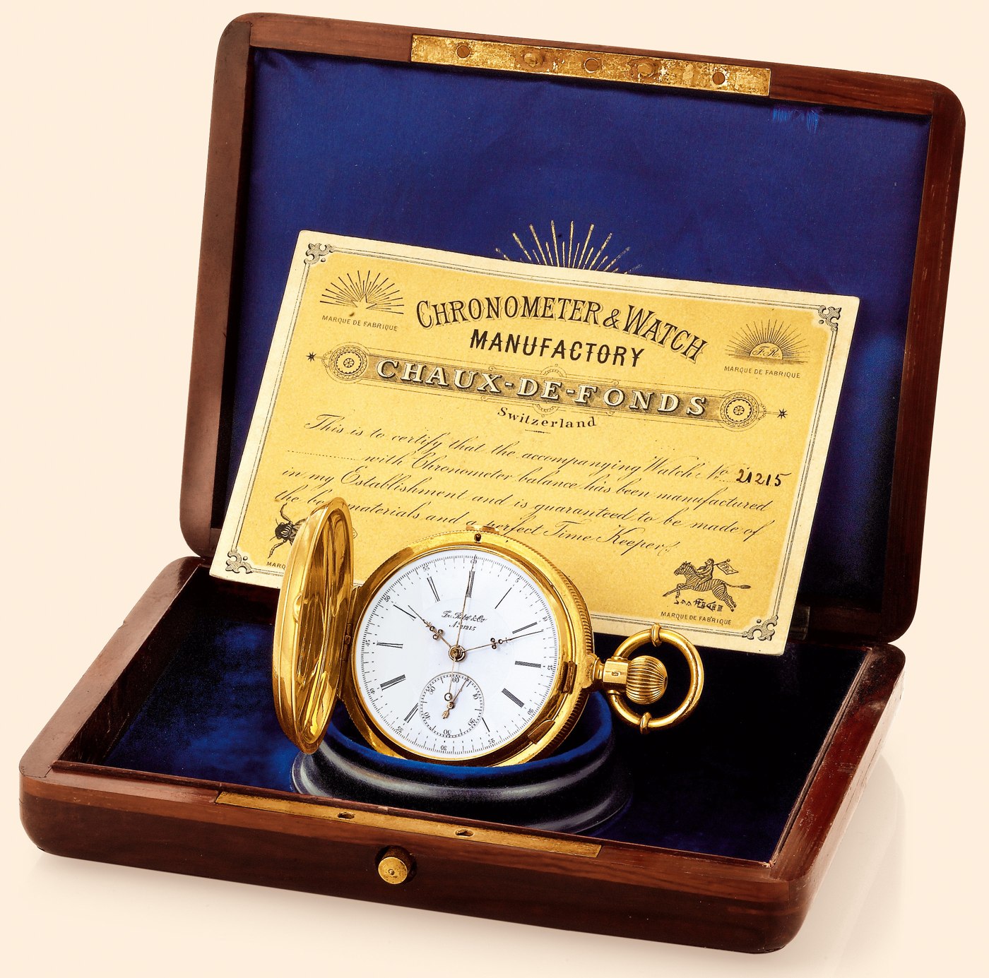 A view of the Fr. Retz & Cie. pocket watch in its fitted box with the accompanying manufacturer's certificate.