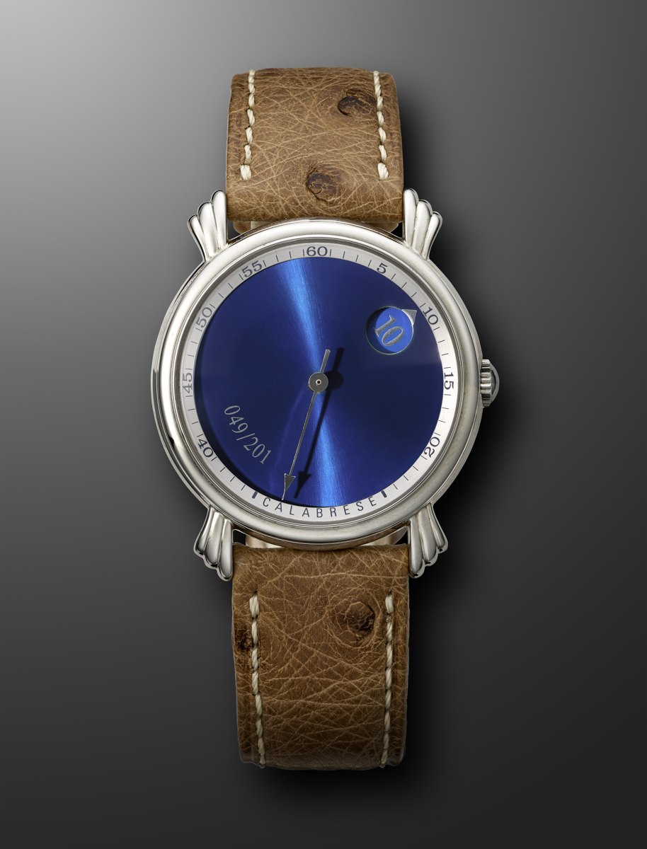 Front view of the Vincent Calabrese Baladin wristwatch showing the blue sunburst jumping hour dial and fluted lugs