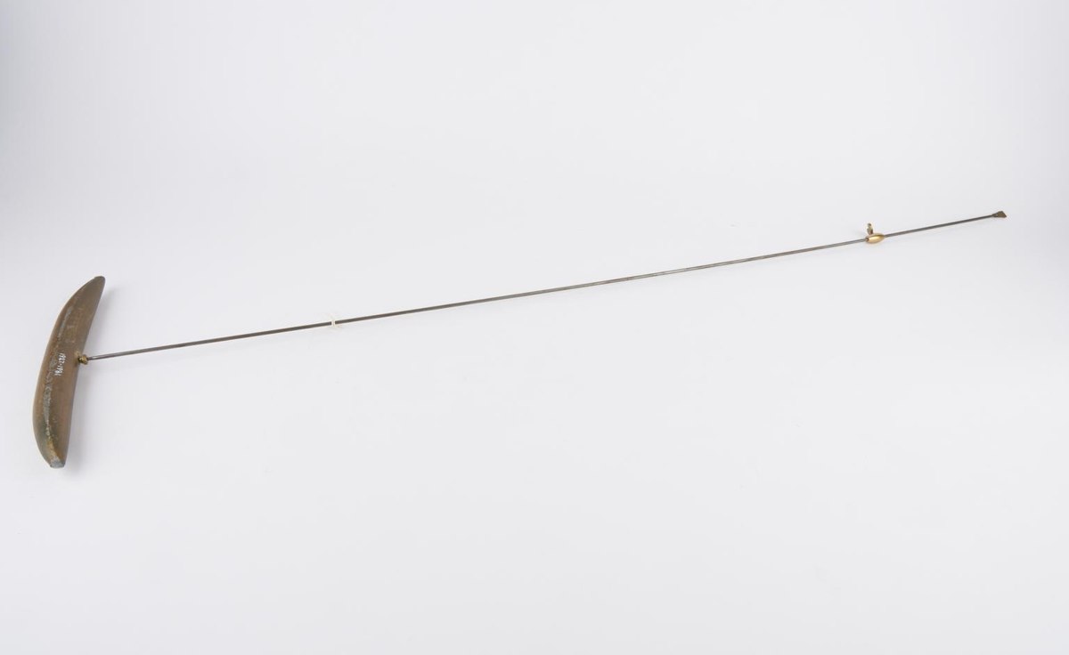 Reproduction Huygens clock pendulum (1927-1981 Pt1/1) showing curved transverse bob and slender rod