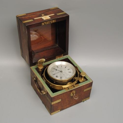Elevated view of the Parkinson and Frodsham chronometer No. 1769 gimballed in its brass-bound mahogany box