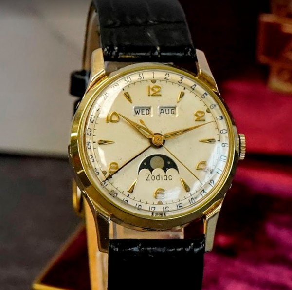 Front view of the Zodiac Triple Date Moonphase wristwatch showing the dial, hands, calendar windows, and moonphase display