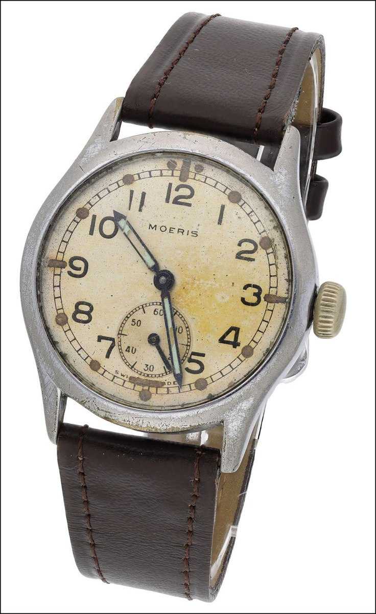 Front three-quarter view of the Moeris British military ATP wristwatch fitted to a brown leather strap