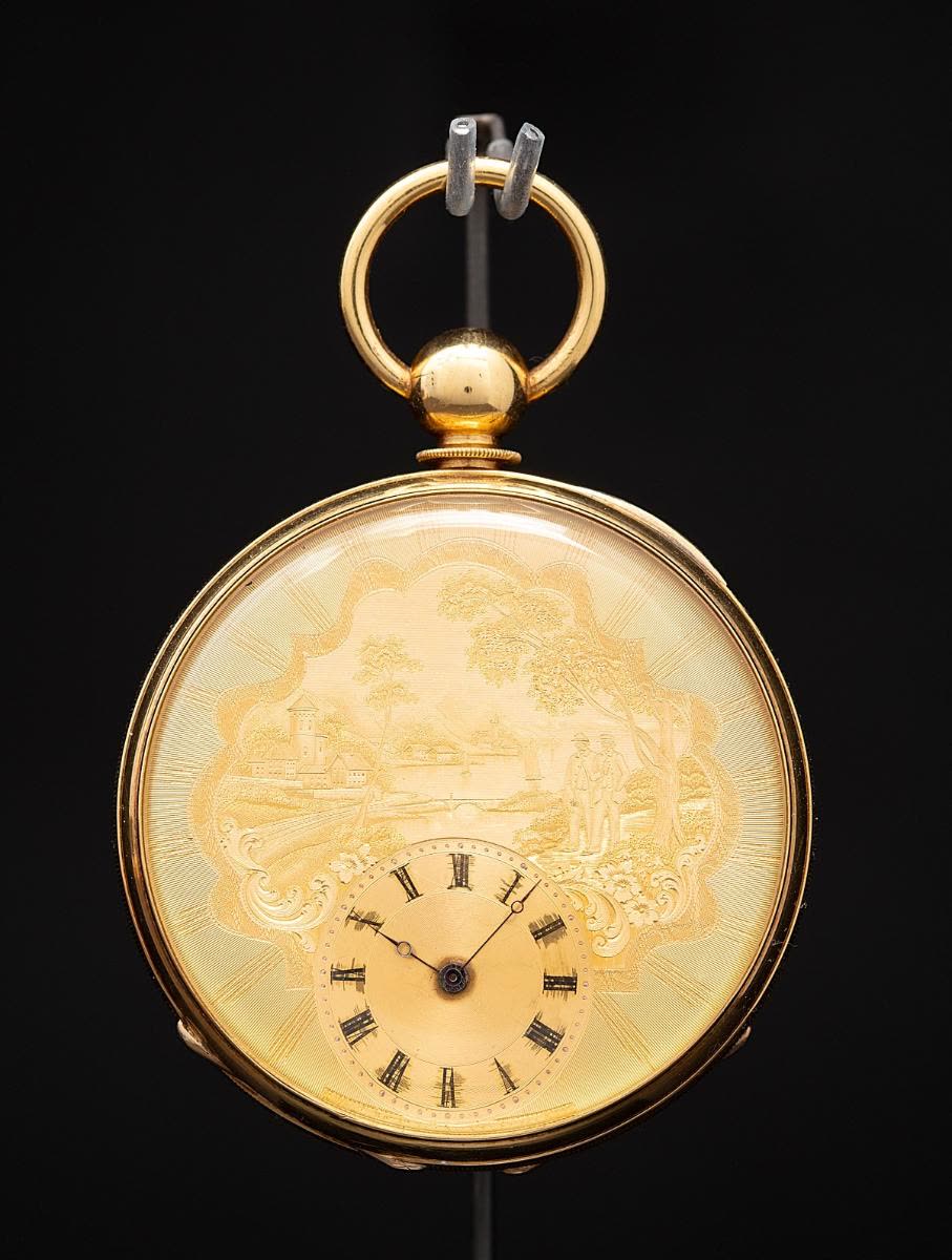 Montre en or ronde gravée (MIH I-171)