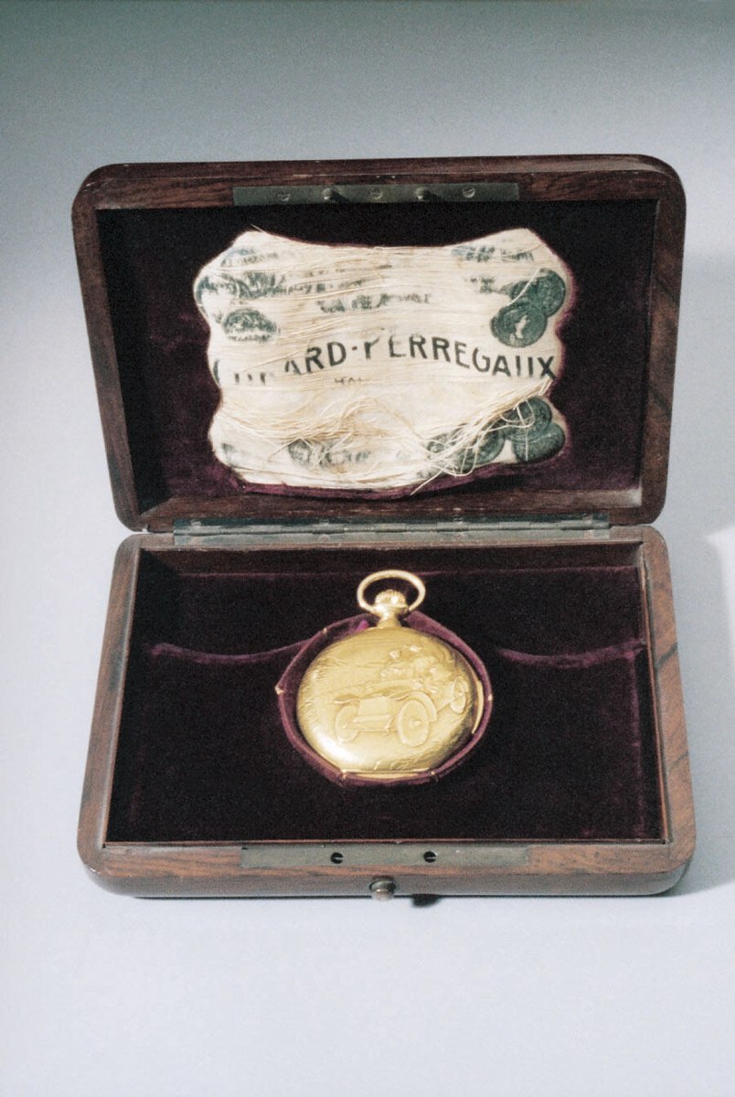 Girard-Perregaux gold minute-repeater pocket chronometer resting in its fitted presentation box