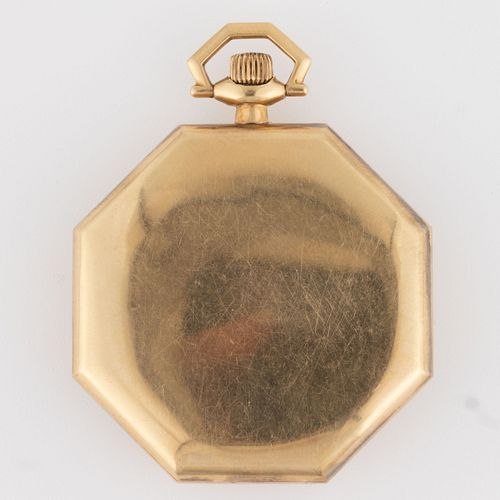 Back view of the Roy 14K yellow gold octagonal pocket watch case showing the winding crown and faceted bow