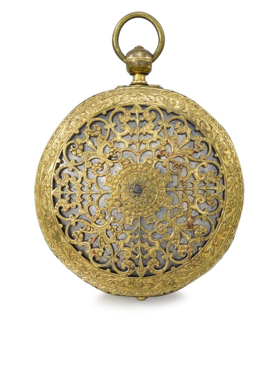 Back view of the pierced and engraved gilt-metal case with suspension ring