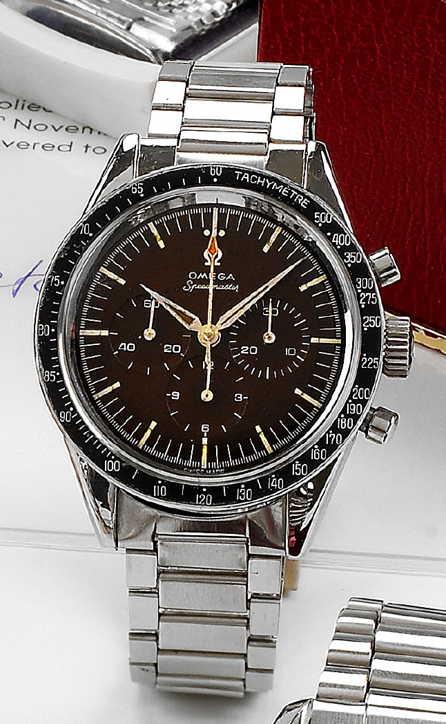 Front view of the Omega Speedmaster reference ST 105.002-62 featuring a black dial and steel bracelet.