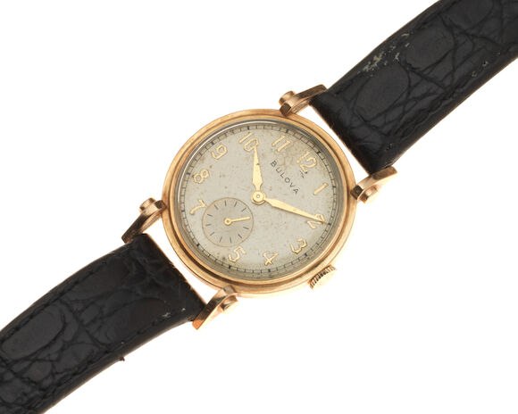 Dial and case view of the Bulova gold plated manual wind wristwatch