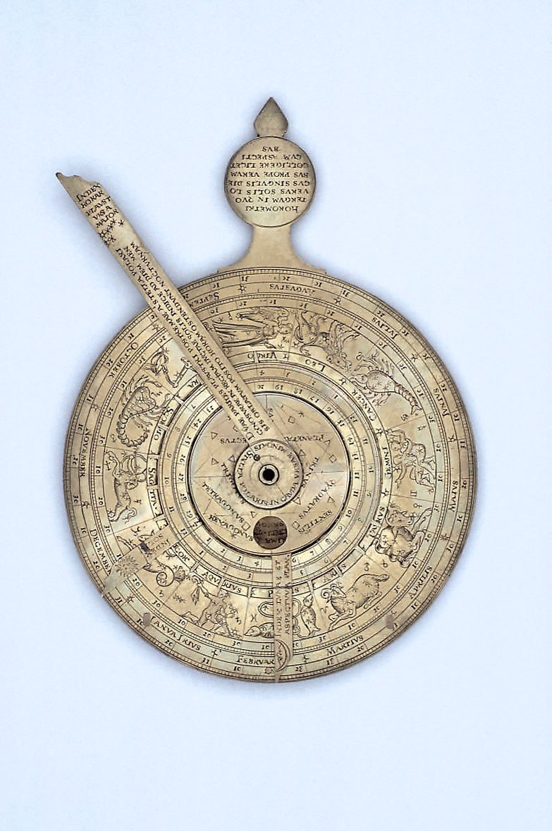 Front side of the nocturnal and sundial instrument showing the central index arm and zodiacal calendar.