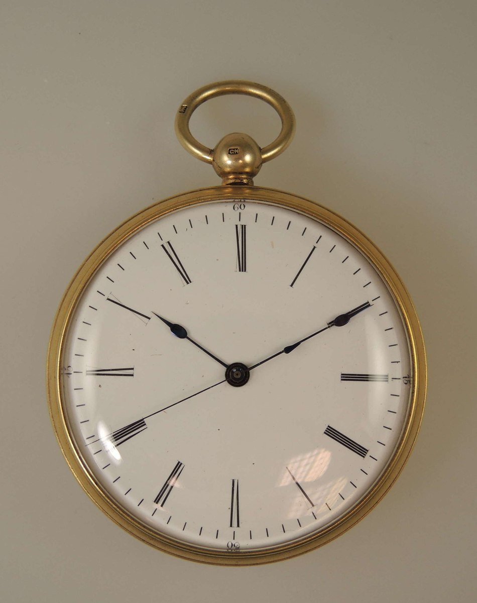 Dial and front view of the Bovet & Fleurier silver-gilt pocket watch