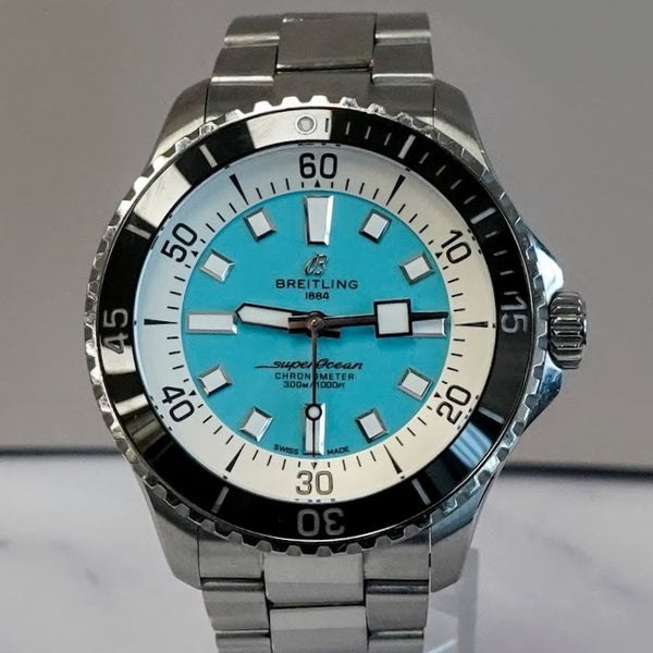 Front view of the Breitling Superocean Automatic reference A17376 showing the turquoise dial and black bezel