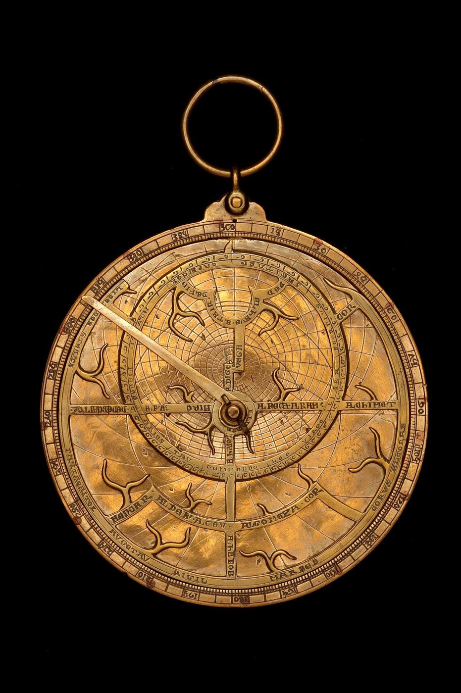 Front view of the 14th-century astrolabe showing the rete, pin, and graduated limb.