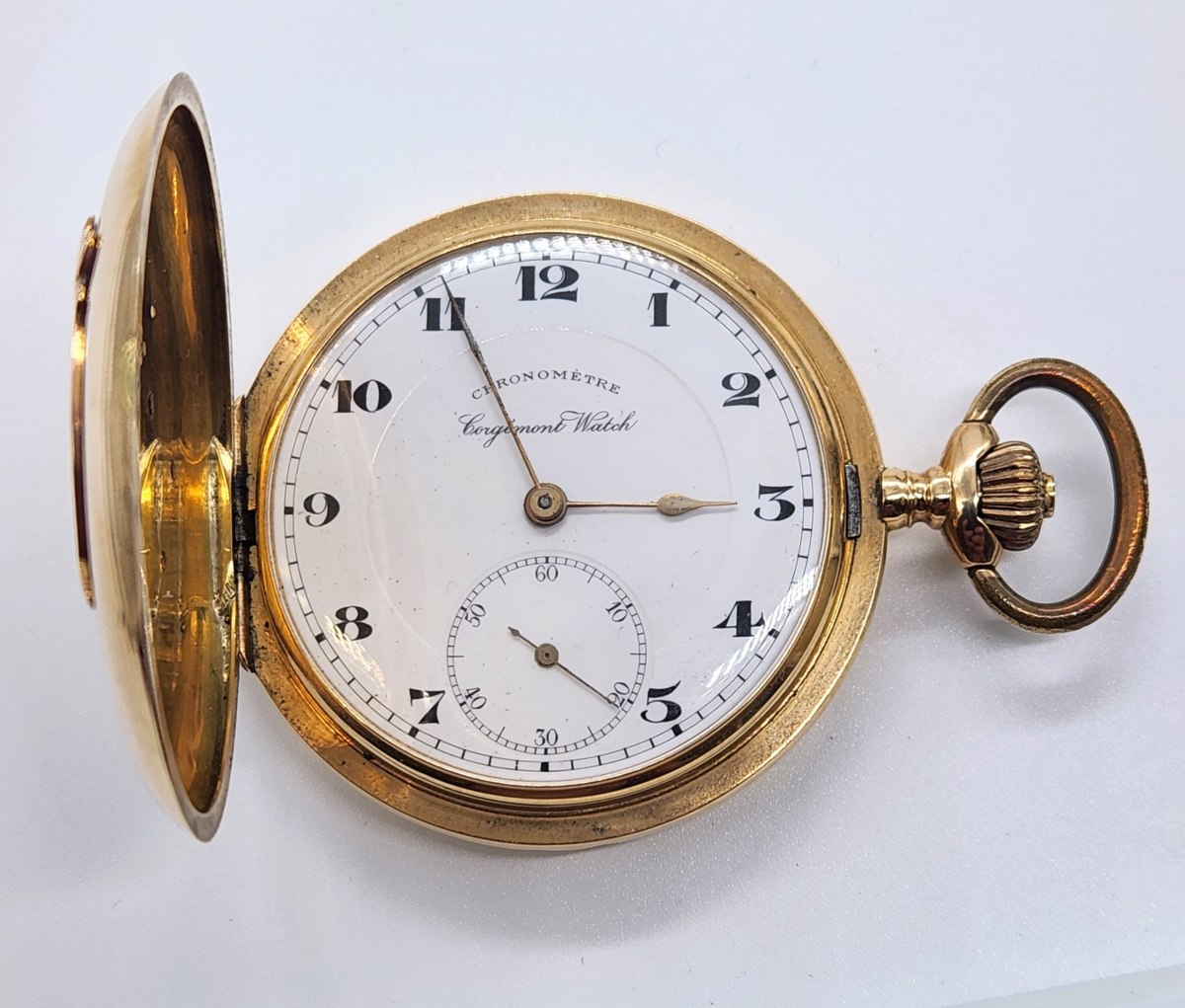 Front view of the open Corgémont 14k yellow gold hunter pocket watch displaying the dial