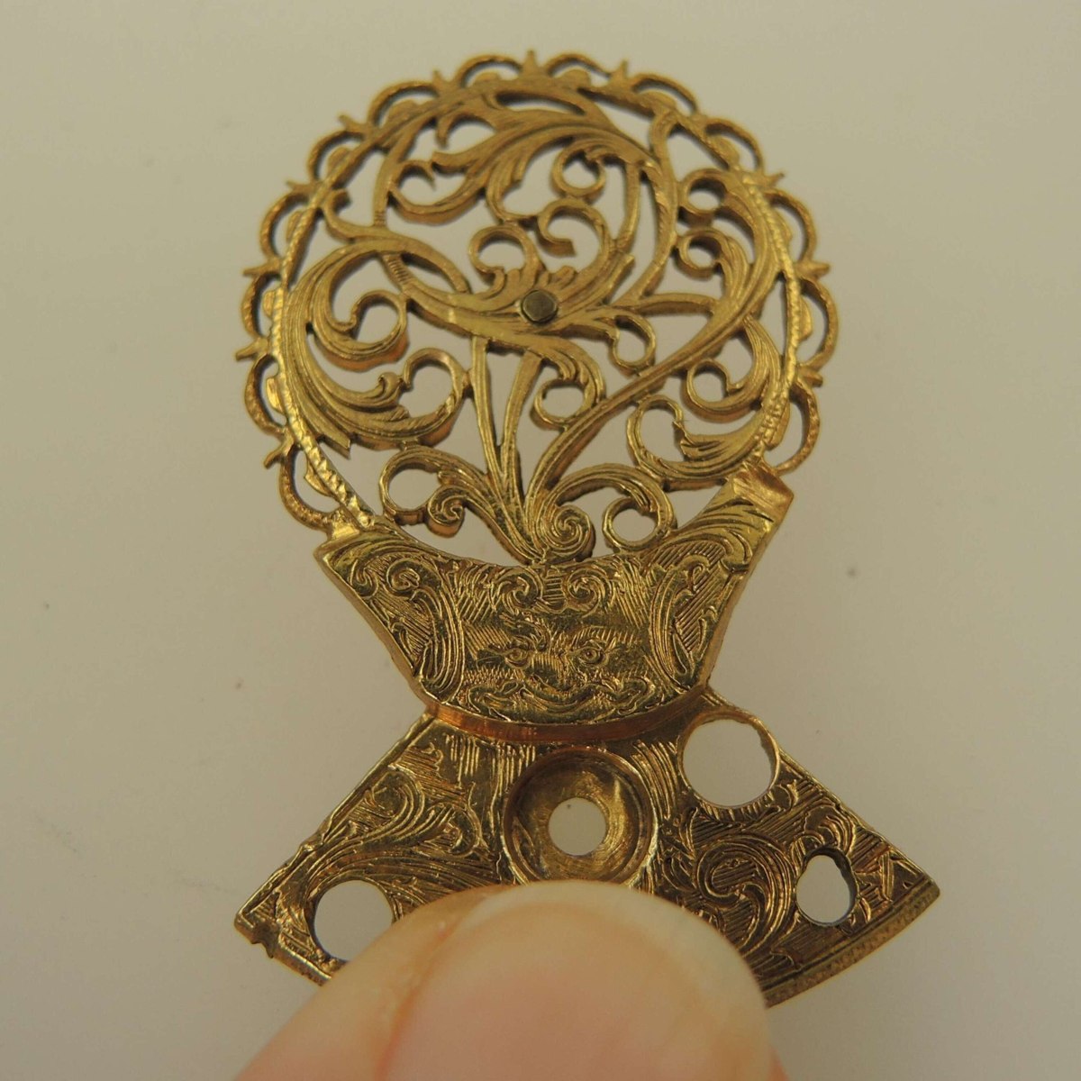 Top view of the pierced and engraved Georgian pocket watch balance cock