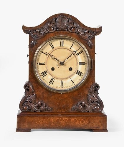 Front view of the Johann Baptist Beha Model 519 B shelf cuckoo clock showing the carved case and painted dial.