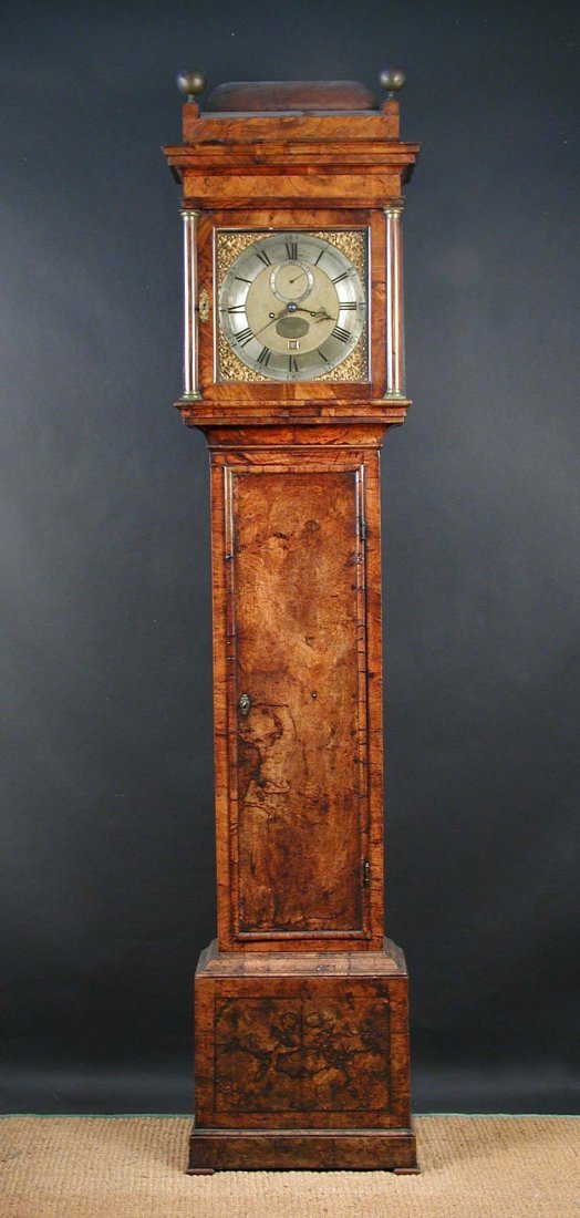 Full frontal view of the George II figured walnut longcase clock