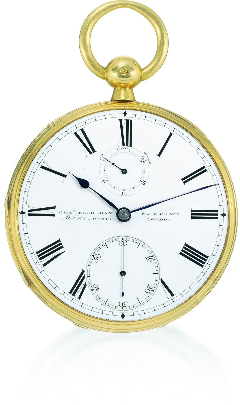 Front view of the 18K gold pocket chronometer, showing the white enamel dial with power-reserve indicator, subsidiary seconds, and Charles Frodsham signature.