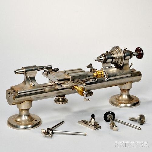 Lorch watchmaker's lathe with compound slide, tailstock, and headstock on steel bed