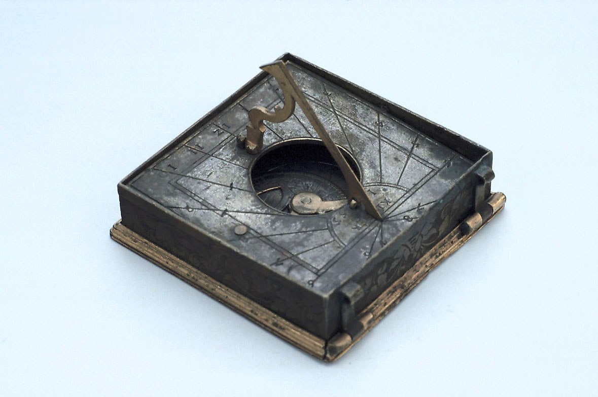 The central section of the astronomical compendium, showing the sundial and folding gnomon.