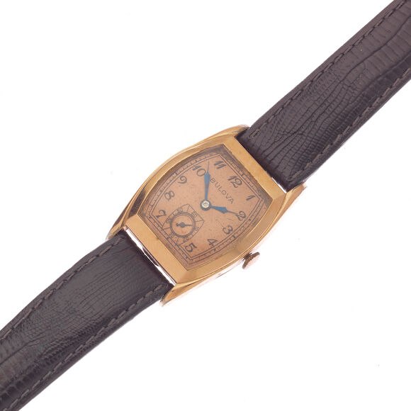 Bulova gold-plated tonneau-shaped manual wind wristwatch, circa 1940