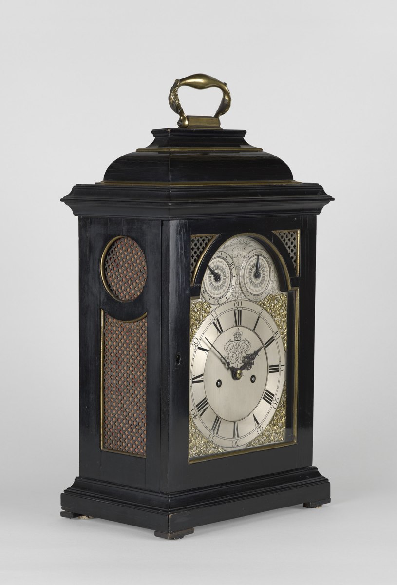 Three-quarter view of the François-Justin Vulliamy bracket clock showing the dial and side fretwork