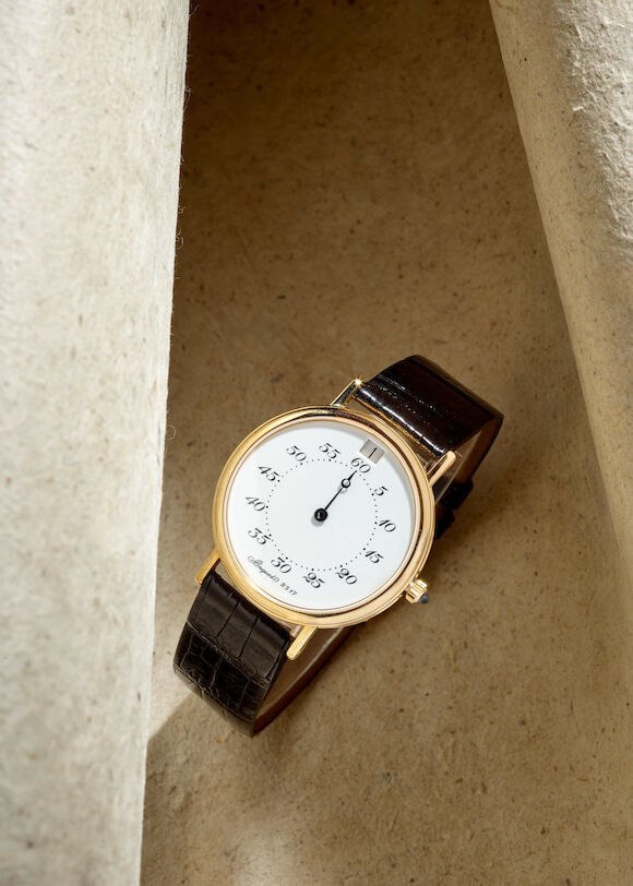 Front three-quarter view of the Breguet jump hour wristwatch on leather strap