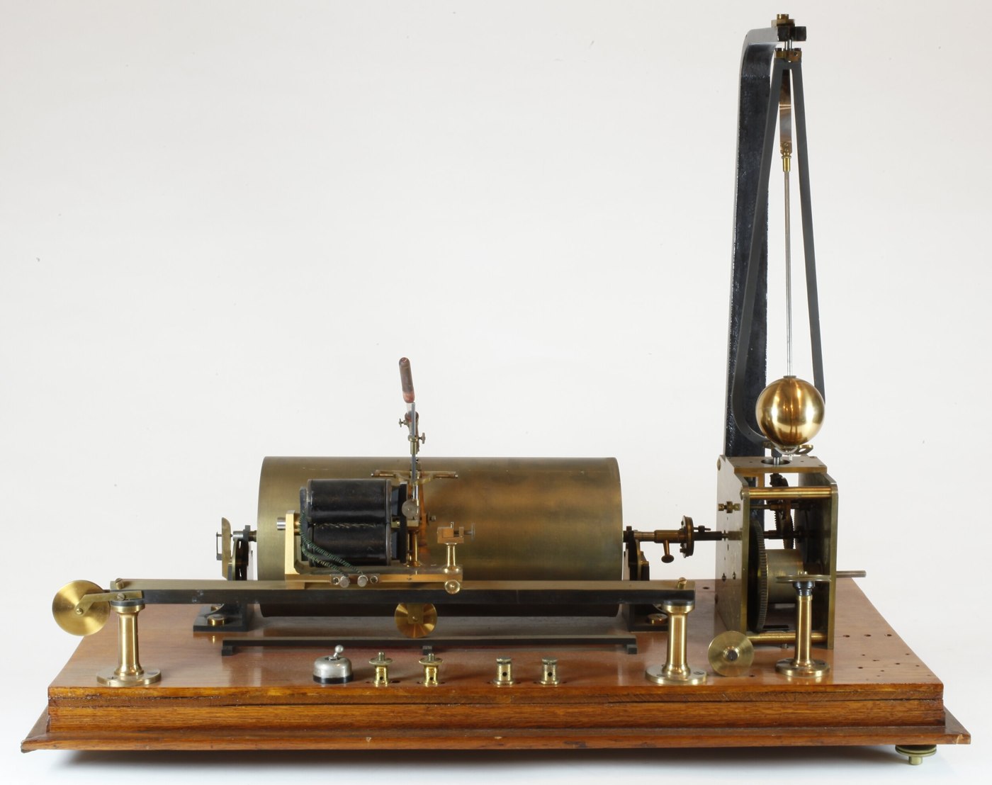 The Melbourne Observatory chronograph, displaying the horizontal recording drum, the electromagnetic coil assembly, and the vertical centrifugal governor.