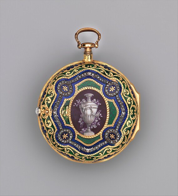 Back view of the outer gold case showing the enameled Neoclassical vase motif.
