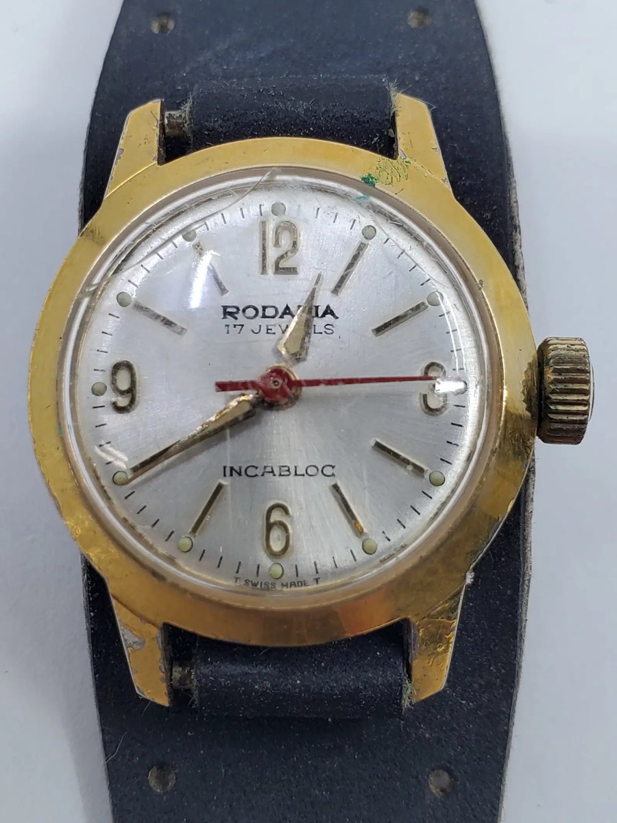 Front view of the Rodania wristwatch dial, case, crown, and strap